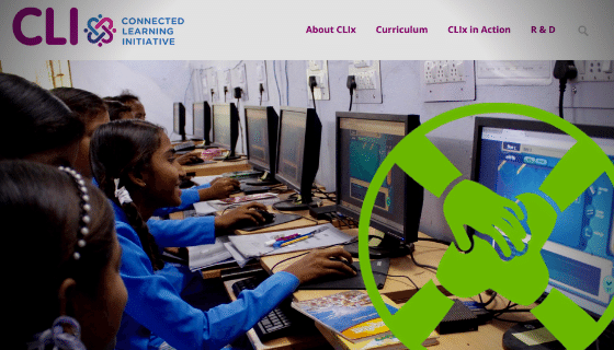 Girls using computers at a lab.